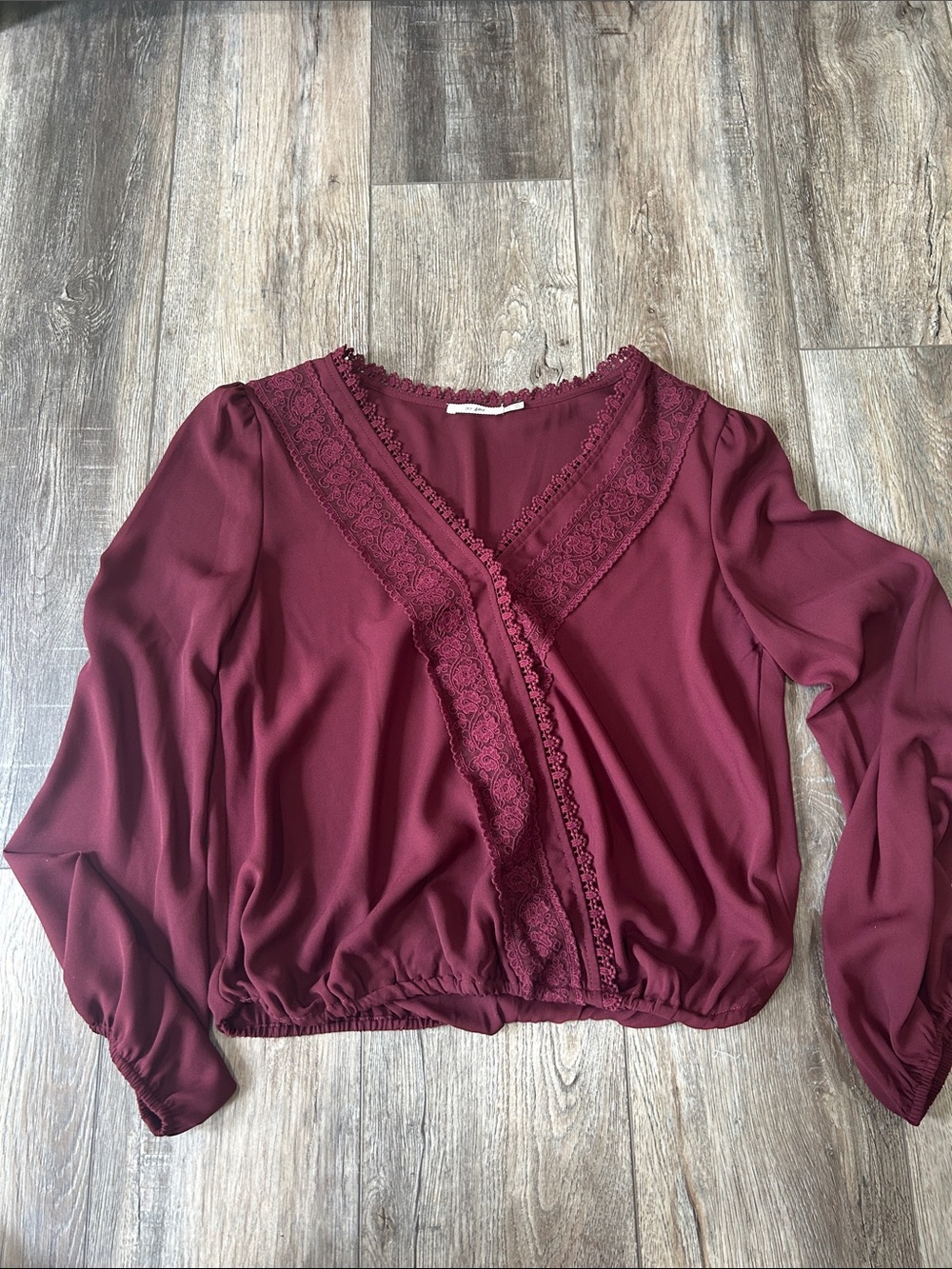 Francesca’s red top